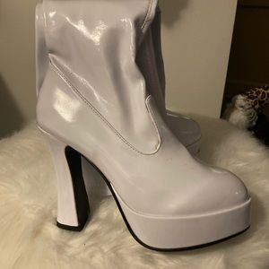 Like new white knee high patent boots size 9